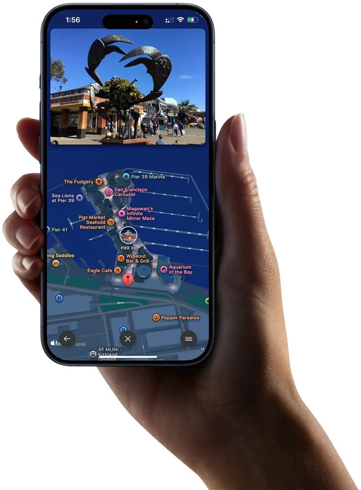 Odyz on an iPhone held in a hand, showing Pier 39 in San Francisco with a photo of the crab sculpture